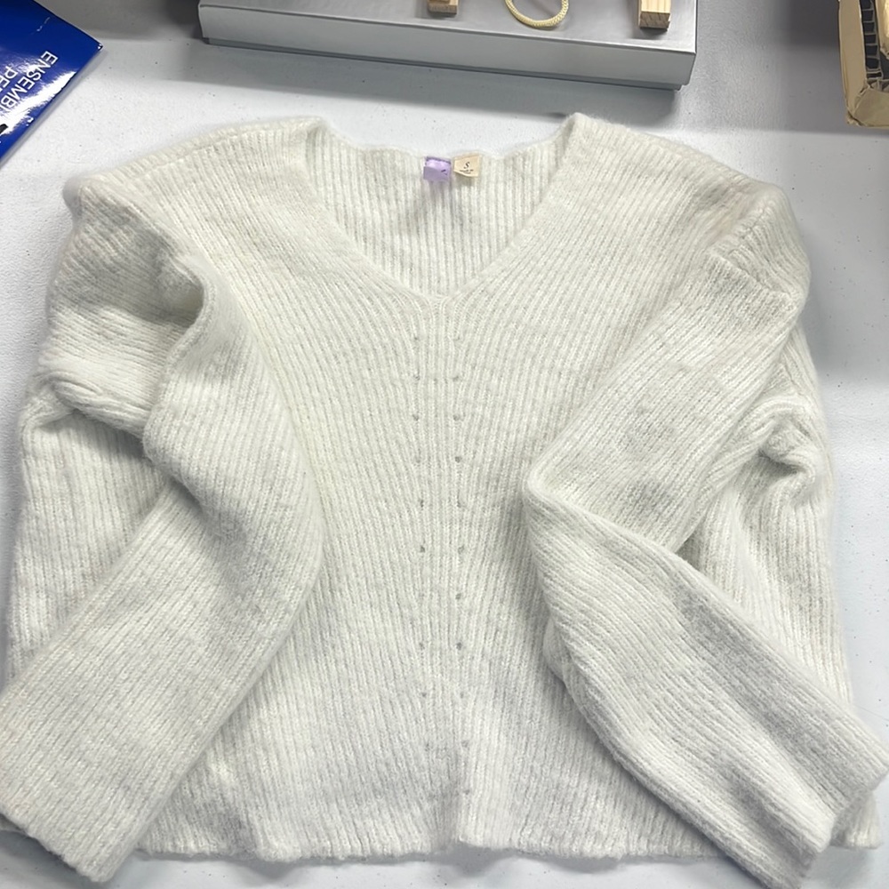 white sweater